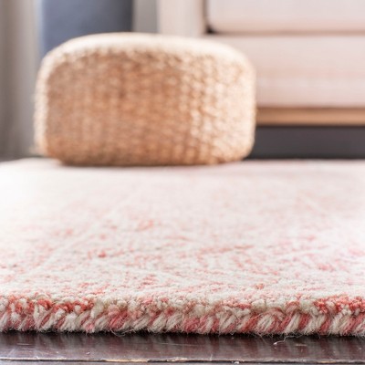 Handmade Pink and Ivory Tufted Wool Rectangular Rug