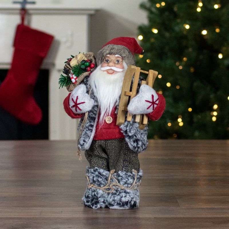 Northlight 12" Standing Santa Christmas Figure Carrying Presents and a Sled, 2 of 6
