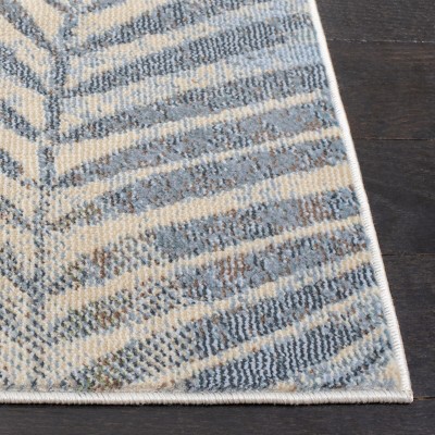 Lillian Blue and Green Floral Synthetic Area Rug