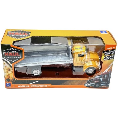 NEW RAY PETERBILT 335 FLAT BED TRUCK LONG HAUL TRUCKER 1:43 SCALE
