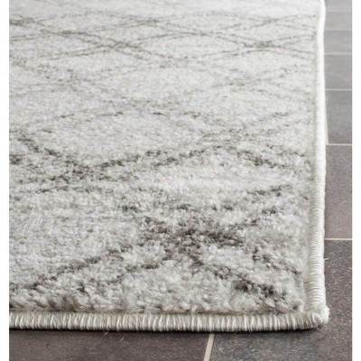 Ivory and Charcoal Synthetic Rectangle Area Rug