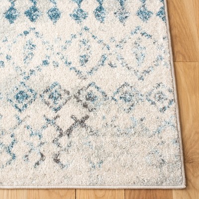 Ivory & Turquoise Geometric 9' x 12' Reversible Synthetic Rug