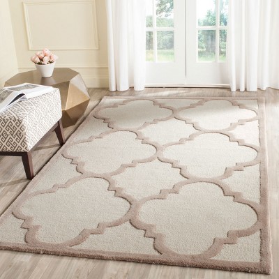 Hand-Tufted Beige/Ivory Wool 6' x 9' Area Rug
