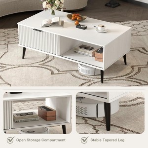 2-Tier Farmhouse Coffee Table with Sliding Wave-Pattern Doors & Storage, Wooden Center Table, White - 1 of 4