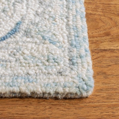 Elegant Light Blue & Ivory Wool 9' x 12' Hand-Tufted Area Rug