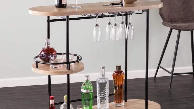 Dumare Wine/Bar Table with Glassware Storage Natural/Black Finish - Aiden Lane, 2 of 10, play video