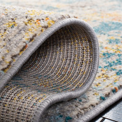 Gray and Blue Abstract 9' x 12' Synthetic Area Rug