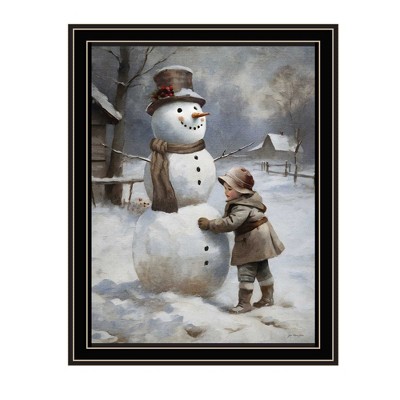 HomeRoots Boy Building A Snowman Black Framed Wall Art