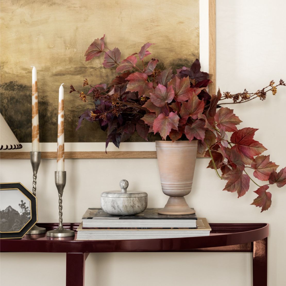 Fall layered decor on console table
