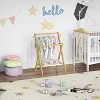 Bamboo baby clothes hanger with storage rack and double pole, lightweight, sturdy, sustainable and foldable, odorless - 3 of 4