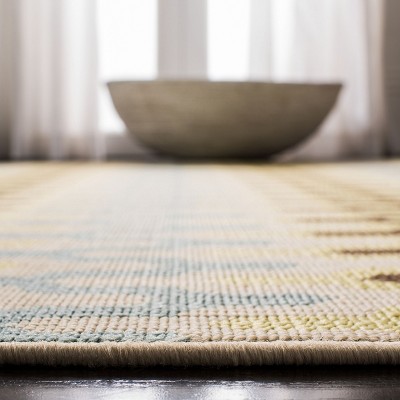 Green and Light Blue Geometric Synthetic Outdoor Area Rug
