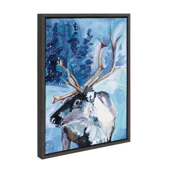Kate & Laurel All Things Decor 18"x24" Sylvie Colorful Majestic Reindeer In Snow Framed Canvas Wall Art by Rachel Christopoulos