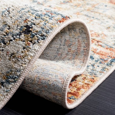 Rust and Blue Hand-Knotted Synthetic Area Rug
