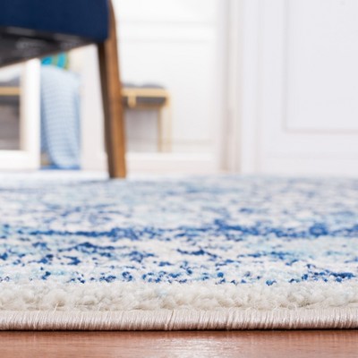 Ivory and Blue 8' x 10' Synthetic Square Area Rug