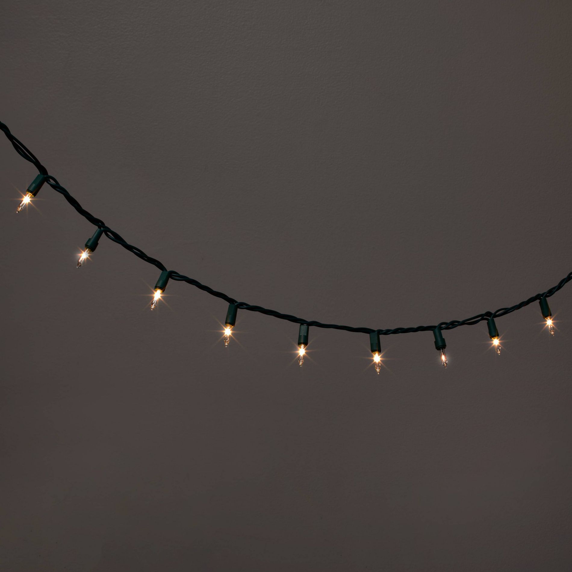 100ct Incandescent Smooth Mini Christmas String Lights Clear Twinkle with Green Wire - Wondershop™