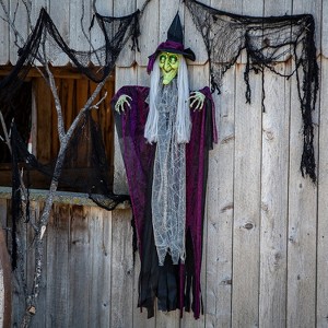 Morris Costumes 4 ft Hanging Animated Witch with Green Eyes Decoration - Black - 1 of 4
