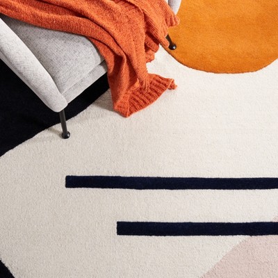 Rodeo Drive 6' x 9' Black and Orange Hand-Tufted Wool Rug