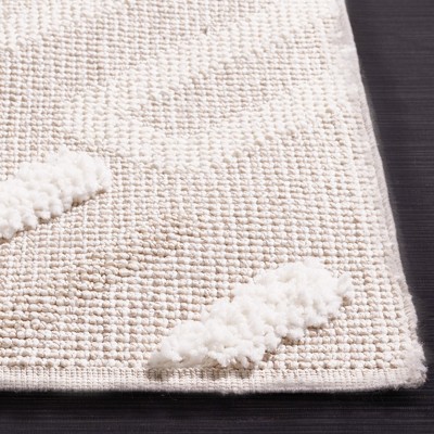 Ivory and Beige Geometric Synthetic 8' x 10' Area Rug