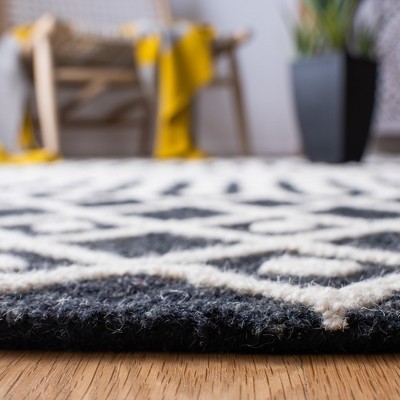 Black and Ivory Hand-Tufted Wool 4' x 6' Area Rug