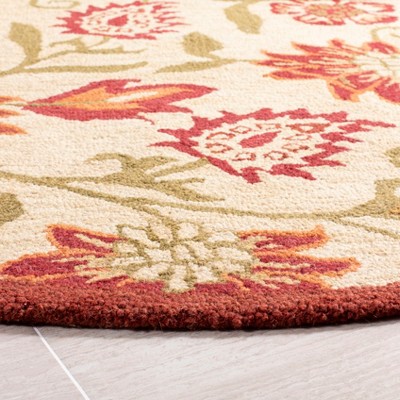 Handmade Red Floral Wool Round Area Rug, 6' x 6'