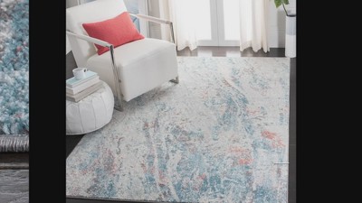 Ivory and Blue Round Abstract Hand-knotted Rug