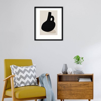 Simon West Black Vase Beige Background Wood Framed Wall Art