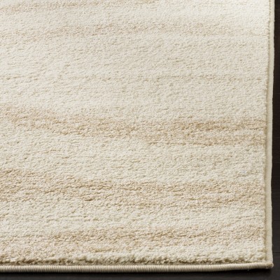 Cream and Champagne Abstract Rectangular 9' x 12' Area Rug