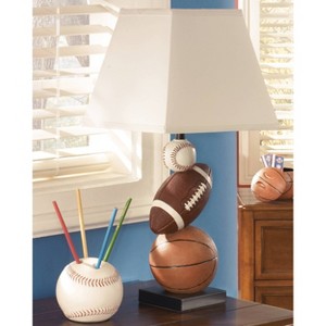 Signature Design by Ashley Nyx Table Lamp: Sports-Themed, Empire Shade, Polyresin Base, UL Listed - 1 of 4