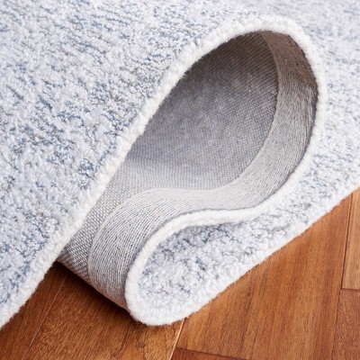 Ivory and Grey Tufted Wool Runner Rug, 9 ft.