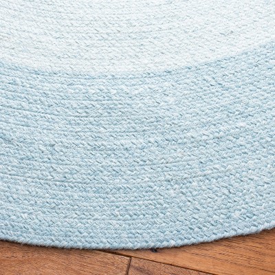 Ivory and Aqua Round Braided Synthetic Area Rug