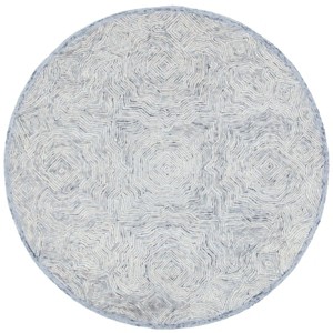 Ikat IKT506 Hand Tufted Rugs - Safavieh - 1 of 3
