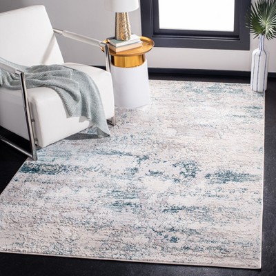 Cream and Turquoise Abstract Wool and Synthetic Area Rug, 3' x 5'