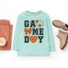 The Juniper Shop Basketball Game Day Coquette Youth Long Sleeve Tee - 3 of 4