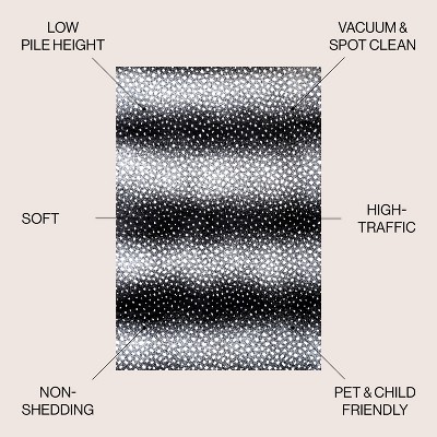 Antelope Abstract Black and Cream Synthetic 5x8 Area Rug