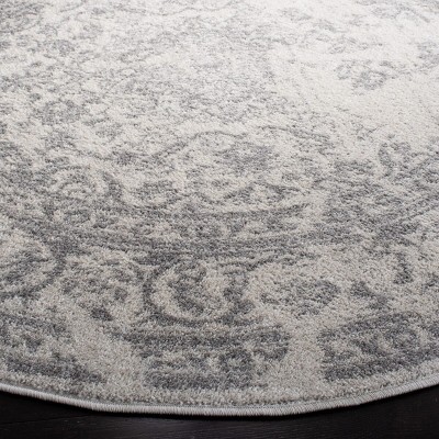 Chic Ivory & Silver 6' Round Synthetic Easy-Care Area Rug