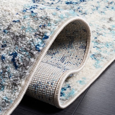 Ivory Boho-Chic Hand-Knotted Synthetic Rectangular Rug