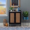 Gordon 2-Door 4 Shelf 1 Drawer Bar Cabinet Black Finish and Natural Cane - Powell: Midcentury, Marble Top, Wine Glass Racks - 2 of 4
