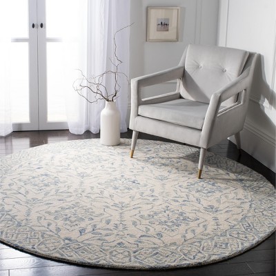 Handmade Light Blue and Ivory Round Wool Area Rug
