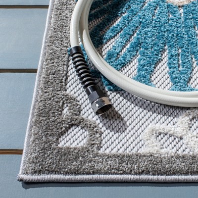 Beige and Blue Floral Synthetic Indoor/Outdoor Area Rug