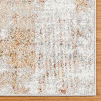 Gray and Beige Synthetic Tufted Reversible 5' x 7' Area Rug