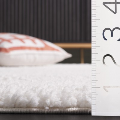 Ivory Rectangular Solid Shag Synthetic Area Rug, 5'3" x 7'6"