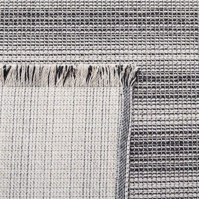 Ivory and Black Striped Synthetic 8' x 10' Area Rug
