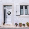AuldHome Design Happiness is Home Grown Rustic Door Sign; Round Wood Farmhouse Style Wall Plaque w/ Old Truck and Spring Flowers - 4 of 4