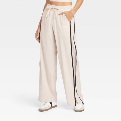 Cream track pants deals