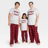 Women's Holiday Buffalo Check Plaid Fleece Matching Family Pajama Pants - Wondershop™ Red - image 3 of 3