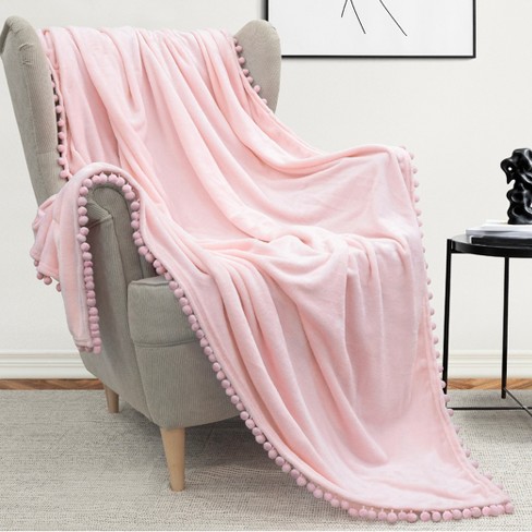 PAVILIA Fleece Pom Pom Blanket Throw for Sofa Bed Soft Lightweight Pompom Fringe Blanket for Couch Light Pink Twin 60x80