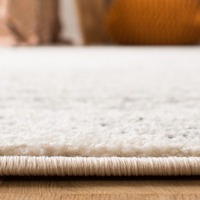 Ivory Boho-Chic Hand-Knotted Synthetic Area Rug