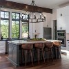 BAOURE Black Wagon Wheel Chandelier 12 Lights Round Chandeliers for Dining Room Light Fixture, Farmhouse Chandeliers for Entryway Living Room - 2 of 4