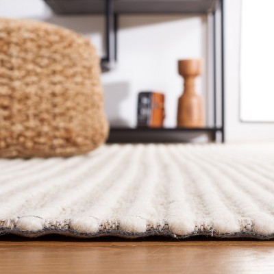Ivory and Beige Handwoven Wool Area Rug, 4' x 6'