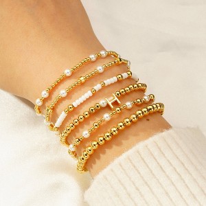 Turandoss 6PCS Gold Initial Bracelet for Women Girls - Stacked Beaded Bracelets for Kids, Layered Letter Pearl Bracelet Set for Girls, Christmas Gifts - 1 of 4